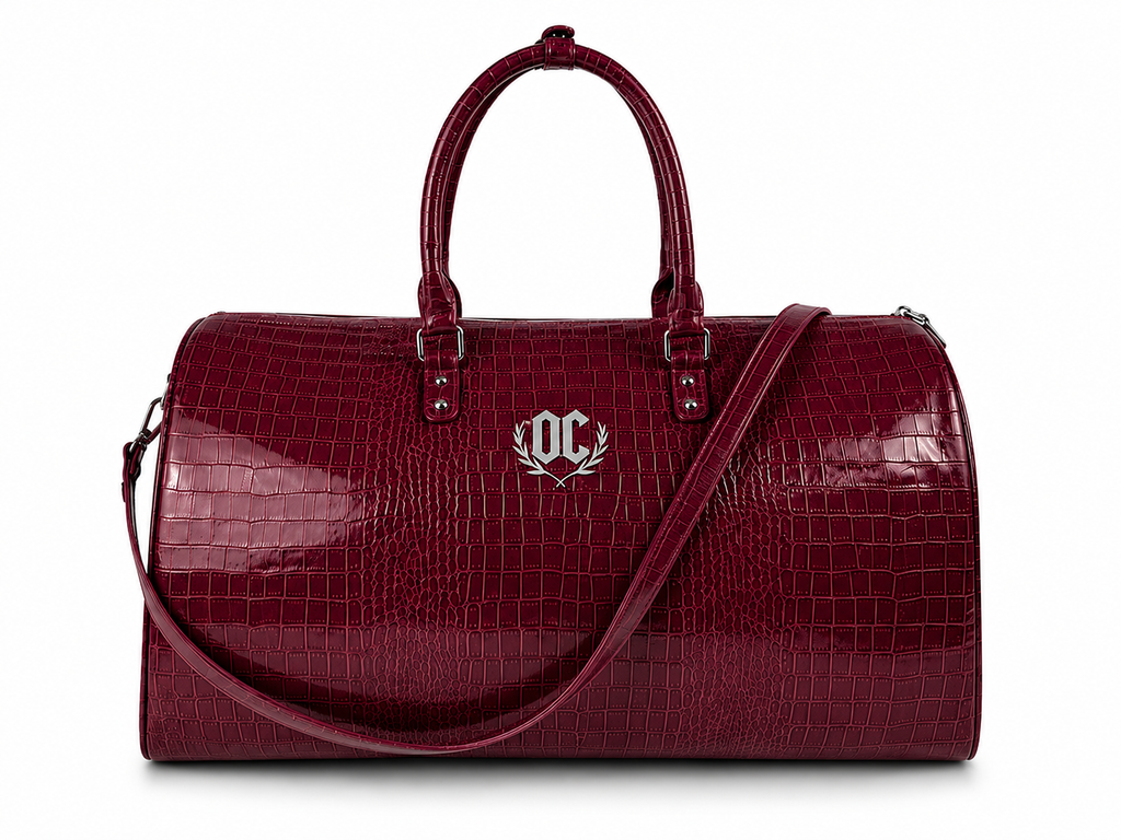 Red BLOODY DUFFEL bag made from crocodile leather with spacious interior for travel and daily use