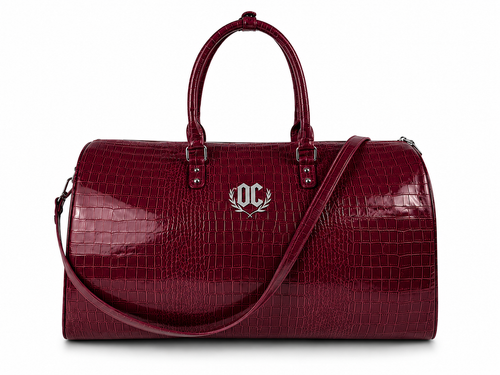 Red BLOODY DUFFEL bag made from crocodile leather with spacious interior for travel and daily use