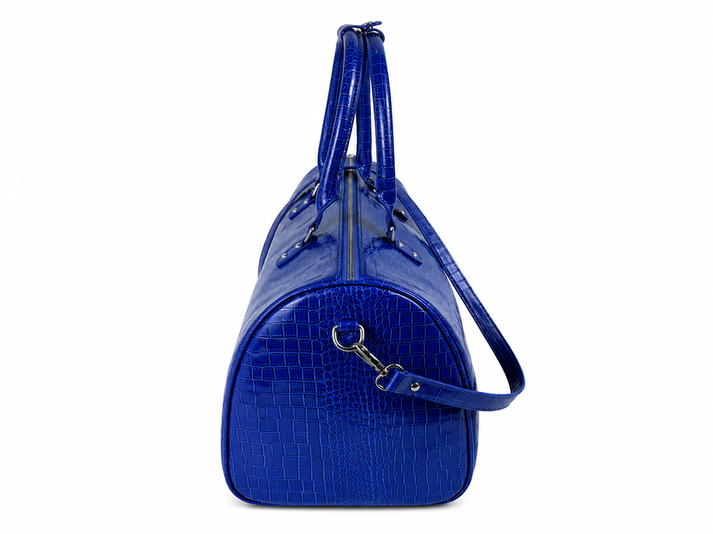 Royal Duffel bag made from royal blue dyed crocodile leather for travel and durability