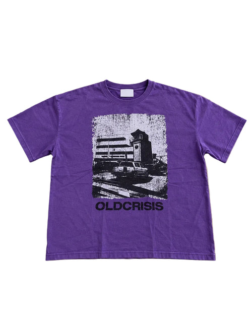 Clock tower graphic T-shirt in purple cotton, featuring a distressed black-and-white architectural print and OLDCRISIS text.