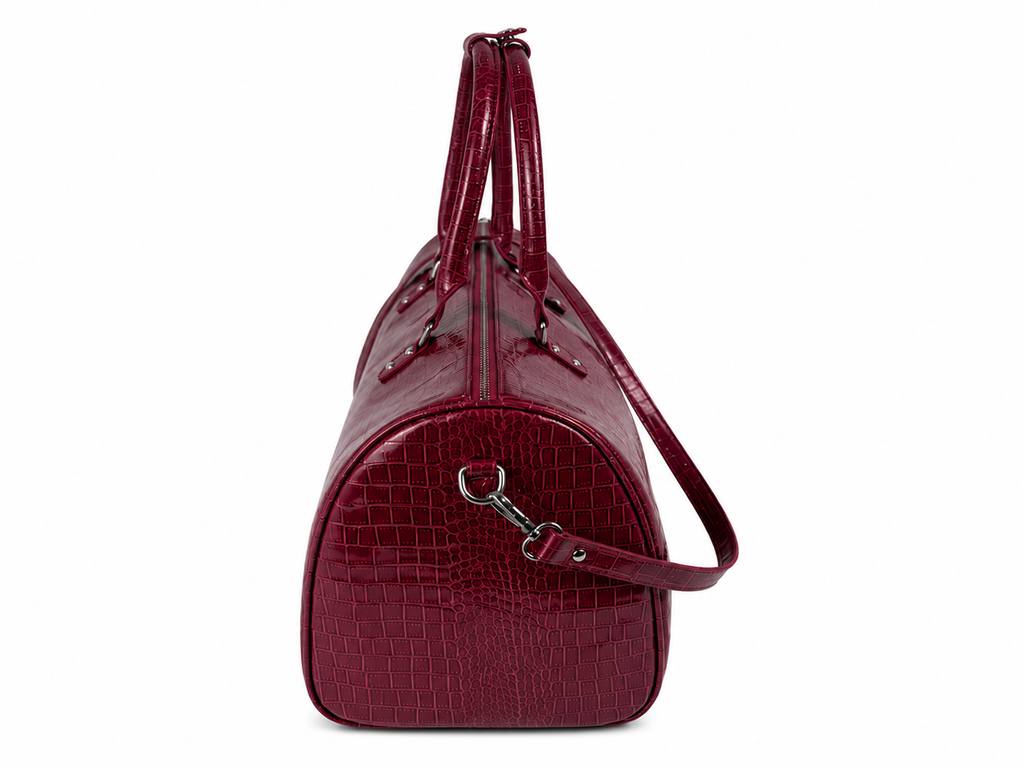 Red crocodile leather BLOODY DUFFEL bag with spacious interior for travel and daily use