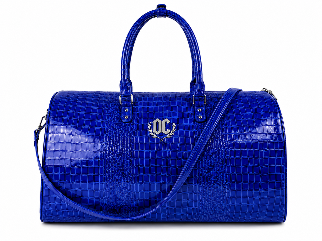 Royal duffel bag made from dyed royal blue crocodile leather for durable and stylish travel